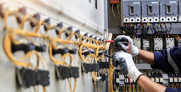 Professional Electrician technician working in Strawberry Point, IA